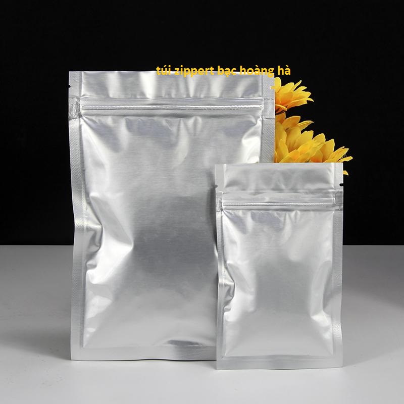 t&uacute;i zipper 2 mặt bạc 